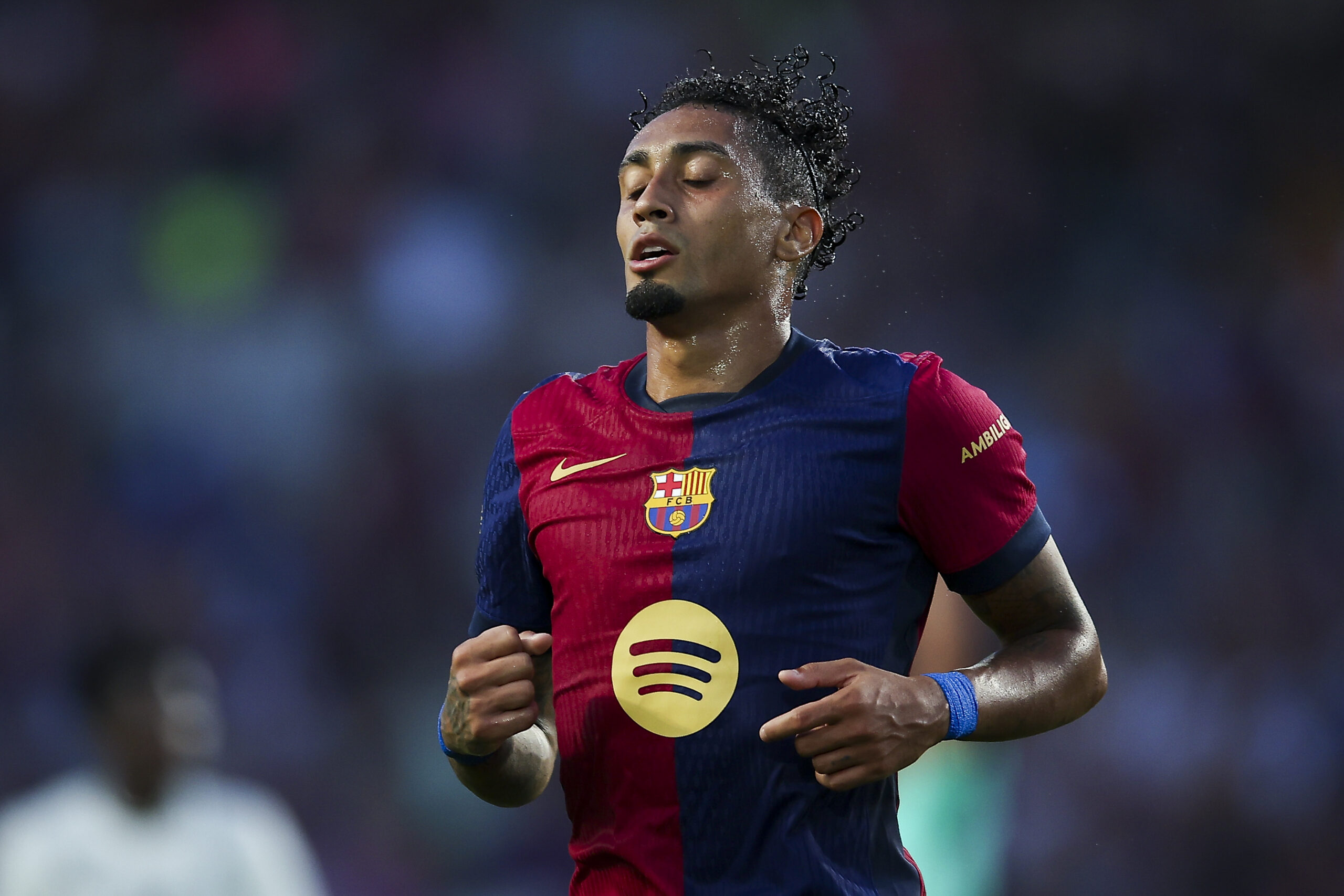 BARCELONA, SPAIN - AUGUST 12: Raphinha of FC Barcelona reacts during the Joan Gamper Trophy match between FC Barcelona and AS Monaco at Estadi Olimpic Lluis Companys on August 12, 2024 in Barcelona, Spain.