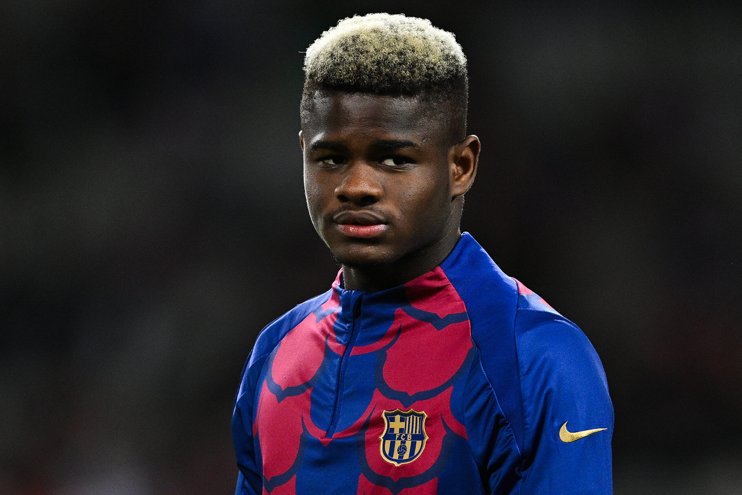 BARCELONA, SPAIN - MARCH 30: Mikayil Faye of FC Barcelona looks on prior to the LaLiga EA Sports match between FC Barcelona and UD Las Palmas at Estadi Olimpic Lluis Companys on March 30, 2024 in Barcelona, Spain.